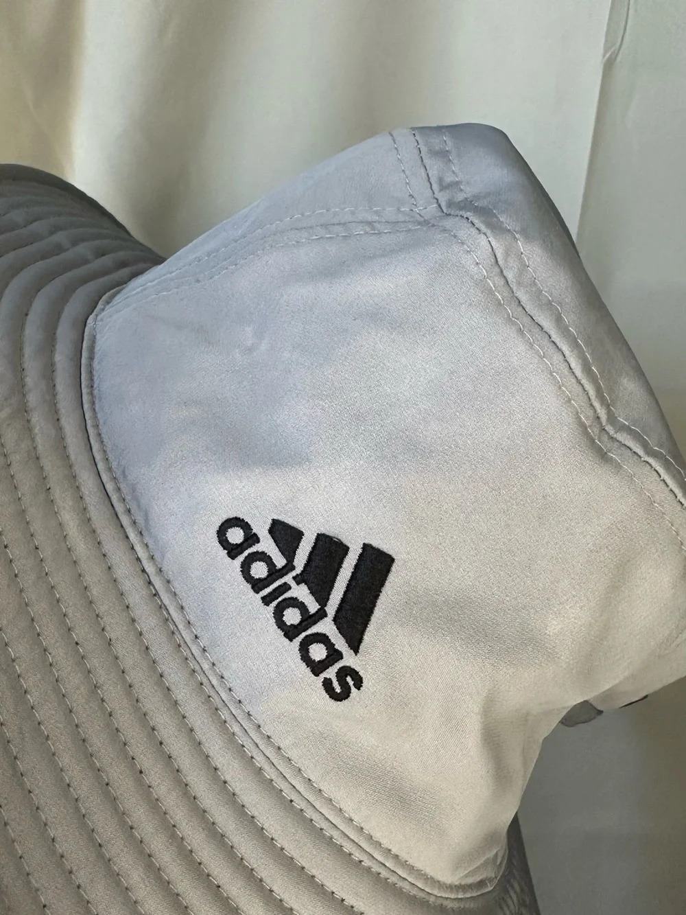 adidas Victory Bucket Hat in grey.
